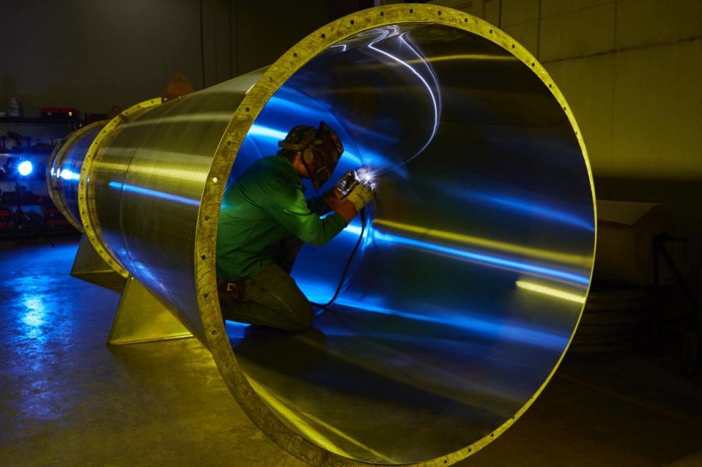 Hurckman employee working on water pipes