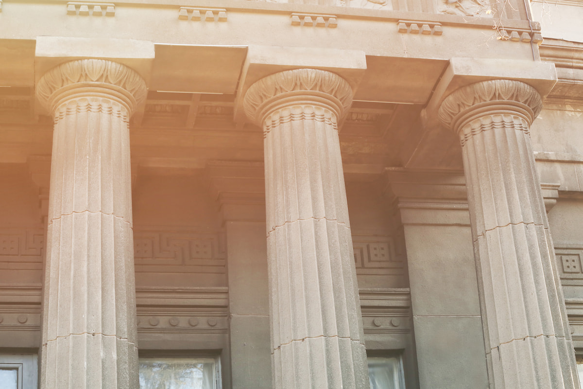 Stone pillars on exterior of a large government building