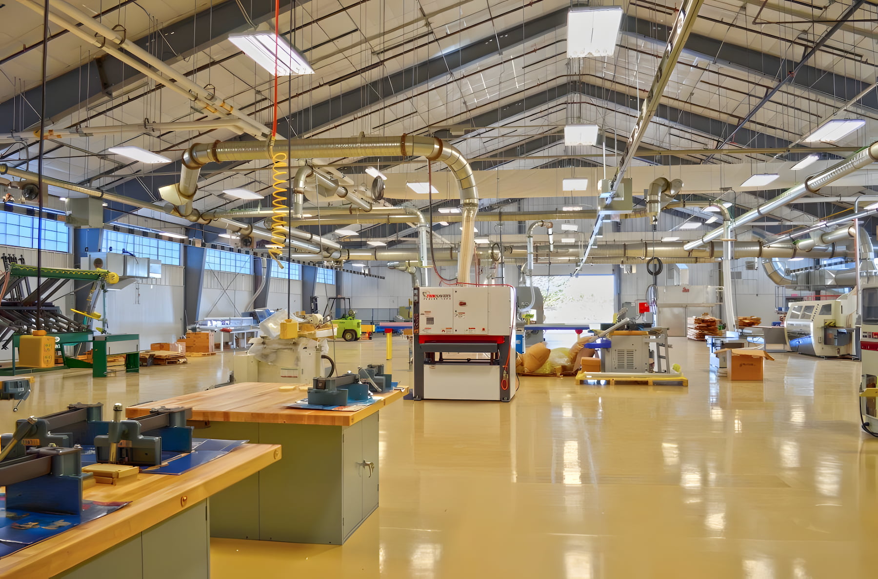 Commercial HVAC and ventilation system installed at Wood Technology Center with ductwork and air filtration