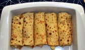 Crêpes farcies roulées dans un plat à four