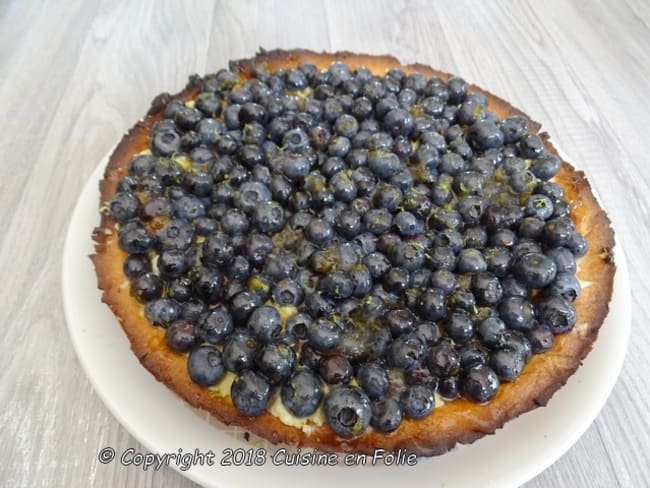 Tarte sablée aux myrtilles sur crème pâtissière, zestes de citron lime