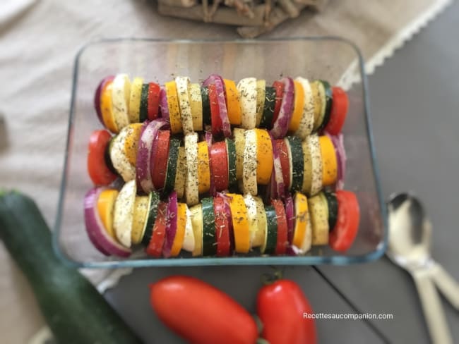 Tian de légumes courgettes, tomates, oignons rouges , pommes de terre et mozzarella