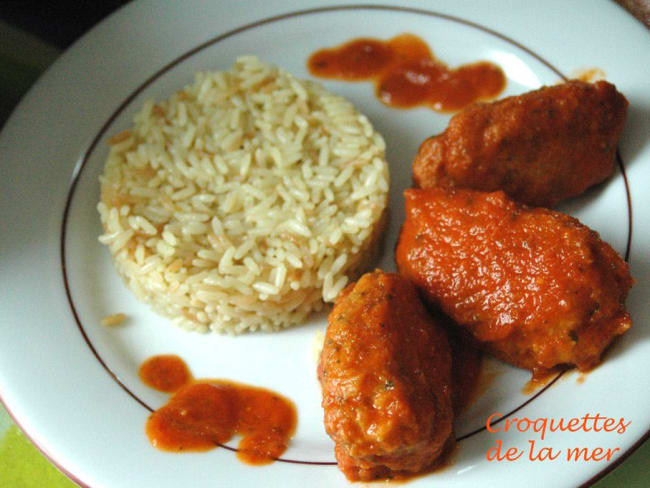 Quenelles de poisson blanc au coulis de tomate