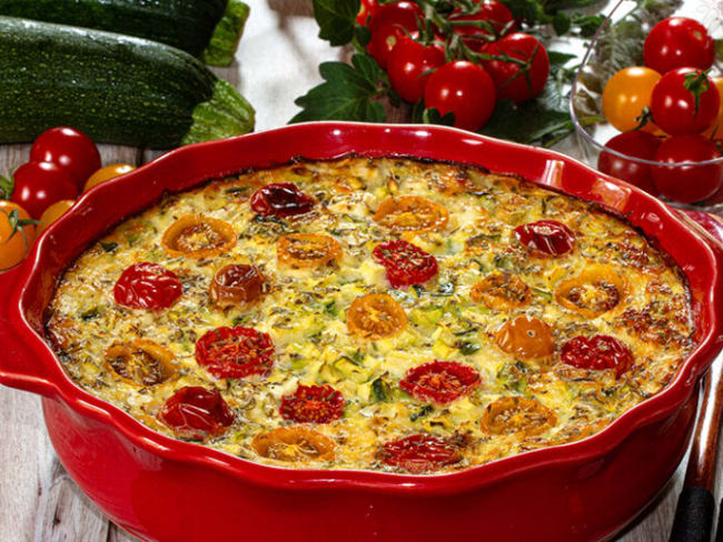 Clafoutis aux tomates cerises, courgettes et fromage de chèvre frais