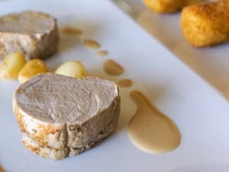 Filet mignon aux gousses d'ail