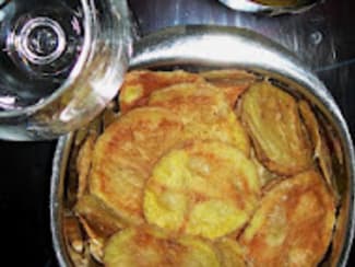 Chips légères de pomme de terre aux sel de mer aromatisé aux herbes aromatiques et piment d'Espelette