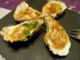 Huîtres gratinées sur lit d'endives braisées à l'estragon