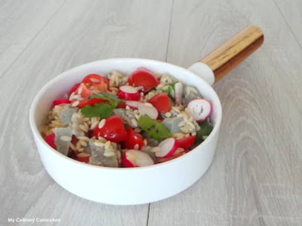 Salade de fonds d'artichauts, tomates et radis à la coriandre