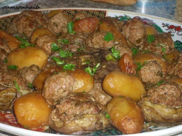tajine d'agneau coeurs d'artichauts farcis en sauce plat Algérien