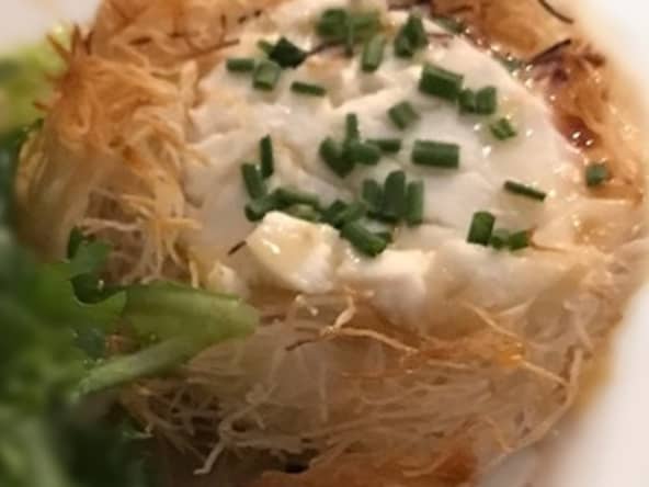 Nid de pommes de terre au de chèvre chaud