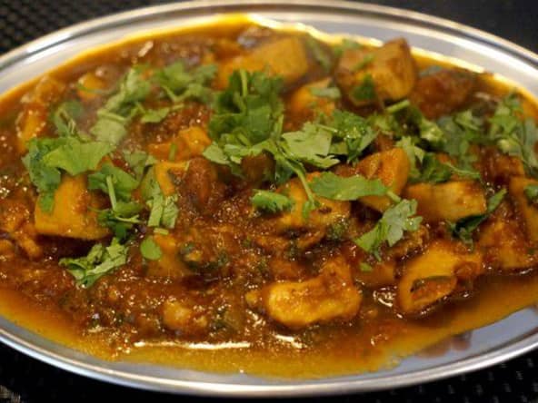 Lamelles d'encornet sauce tomate au vin blanc