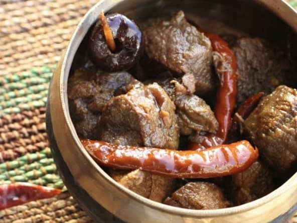 Civet de marcassin confit aux piments