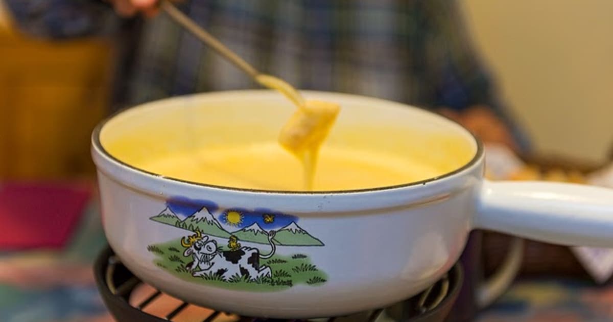 Fondue savoyarde au fromage mariné, saveurs pommes, citron et kirsch