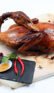 Canard laqué, piment et sauces