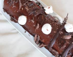 Bûche mousse chocolat, zestes de citrons verts, framboises et biscuit noix de coco