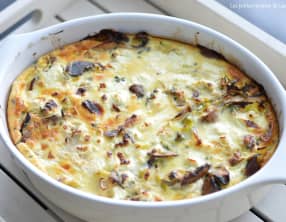 Flan de poireaux, champignons et chèvre aux gésiers de canard confits