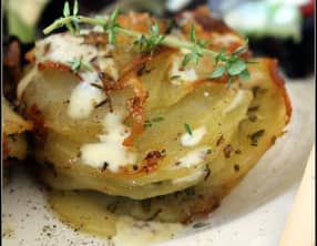 Pommes anna au thym et au romarin