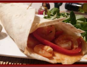 Fajitas aux crevettes et poivrons.