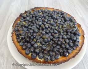 Tarte sablée aux myrtilles sur crème pâtissière, zestes de citron lime