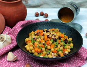 Curry de pois chiches aux petits pois et noisettes