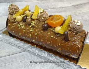 Bûche chocolat,ganache montée chocolat, clémentines corses, glaçage praliné