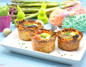 Nids de pommes de terre, jambon, asperges et œuf