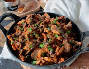 Emincé de dinde aux champignons et aux lardons