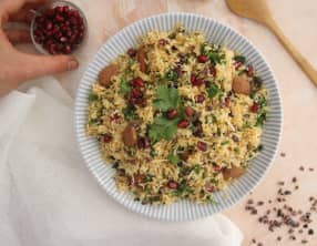 Salade de semoule de chou fleur à la grenade, ras-el-hanout, amandes et fèves de cacao
