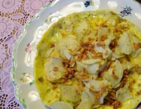 Omelette aux chips de pommes de terre et oignons séchés par Eric Frechon