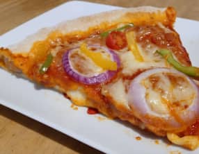 La pizza à la pâte extra gourmande