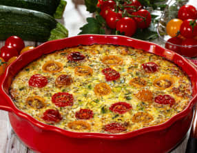 Clafoutis aux tomates cerises, courgettes et chèvre frais
