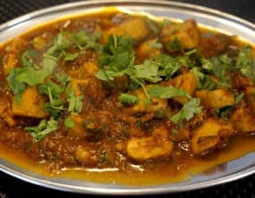 Lamelles d'encornet sauce tomate au vin blanc