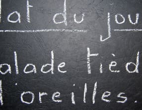 Salade tiède d'oreilles de porc