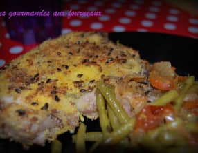 Côte de porc en croûte de polenta et graines de lin brun