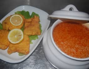 Filets de merlu au riz à la tomate