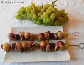 Brochettes de canard aux raisins, miel et pommes de terre grenailles