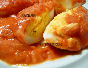 Oeufs gratinés à la tomate.