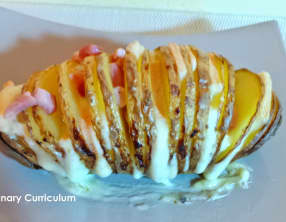 Pommes de terre suédoises au fromage raclette et aux allumettes fumées