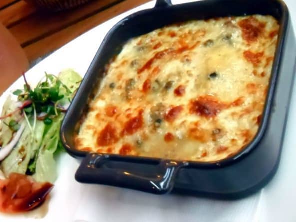 Escalopes de porc gratinées aux champignons et à la crème