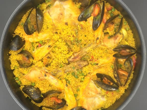 Paella de cuisses et râbles de lapin au quinoa