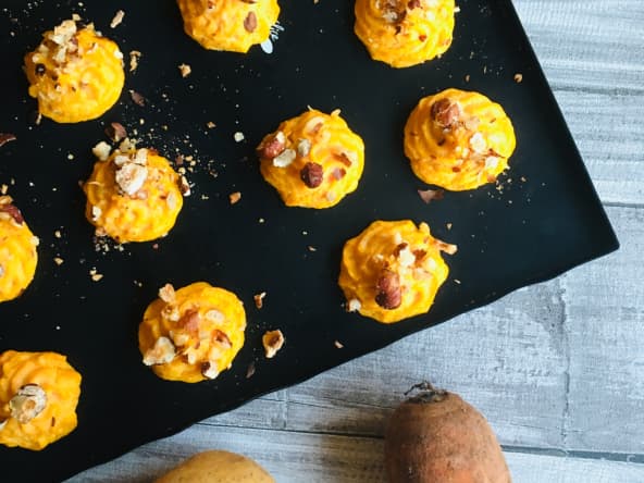 Pommes duchesse carottes et pommes de terre aux brisures de noisettes