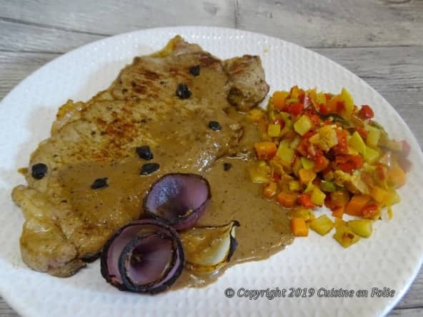 Entrecôtes de boeuf sauce aux oignons brûlés et ail noir Bio Blak Garlic