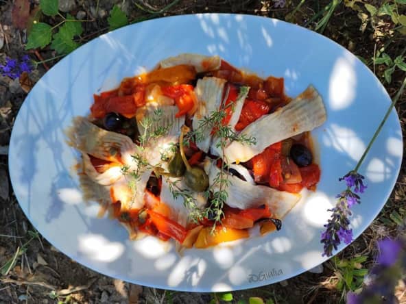 Ailes de raies aux poivrons confits au four