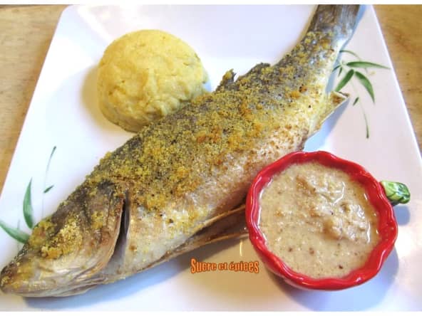 Bar grillé au four, sauce à l'ail et aux noix pour un repas léger