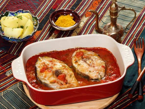 Darnes de cabillaud au curry, ail et tomate