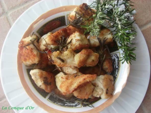 Petits cubes de poulet en sauce citronnée