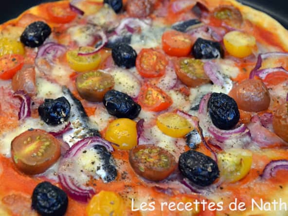 Pâte à pizza au cheddar parmesan et sa garniture