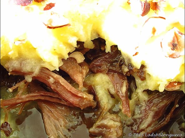 Parmentier de canard confit aux noisettes