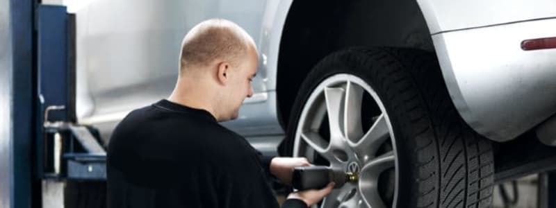 Mechanic changing tyres