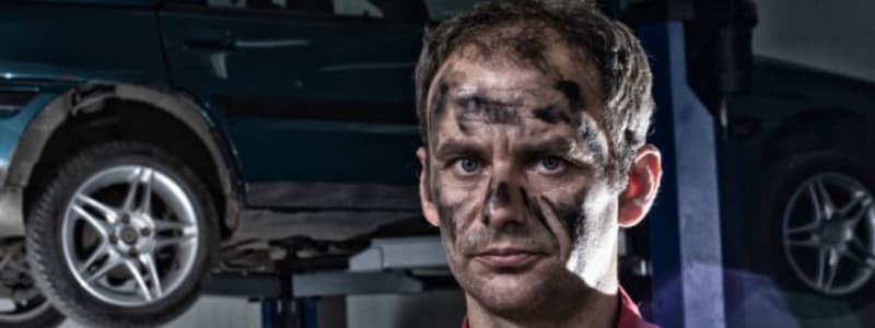 Mechanic with dirty face Learn what a garage actually does